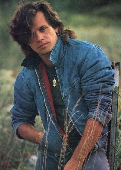 Michelle's rich and dashing father, John Mellencamp.